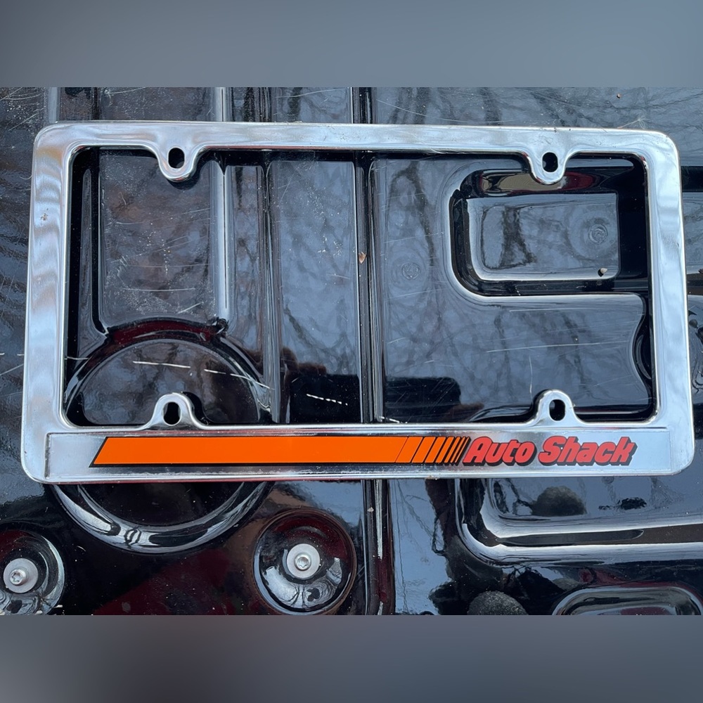 Vintage Auto Shack license Plate holders